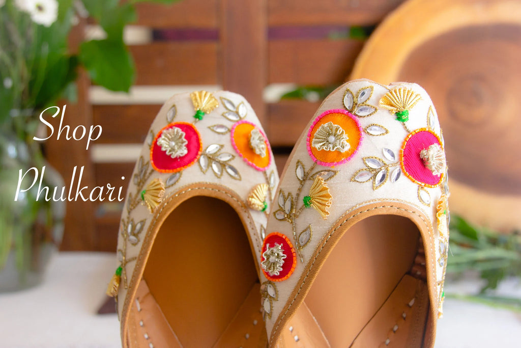 Off white handcrafted Phulkari Jutti from amaryllis